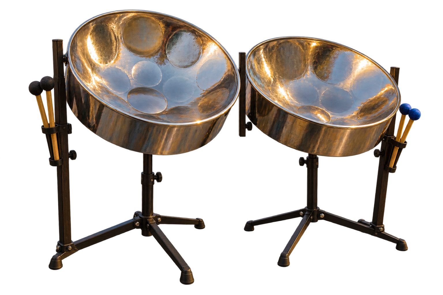 Two steel drums on stands beside the lake